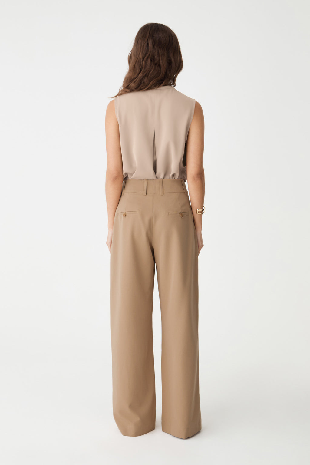 Back view of the bone top with back tuck detail