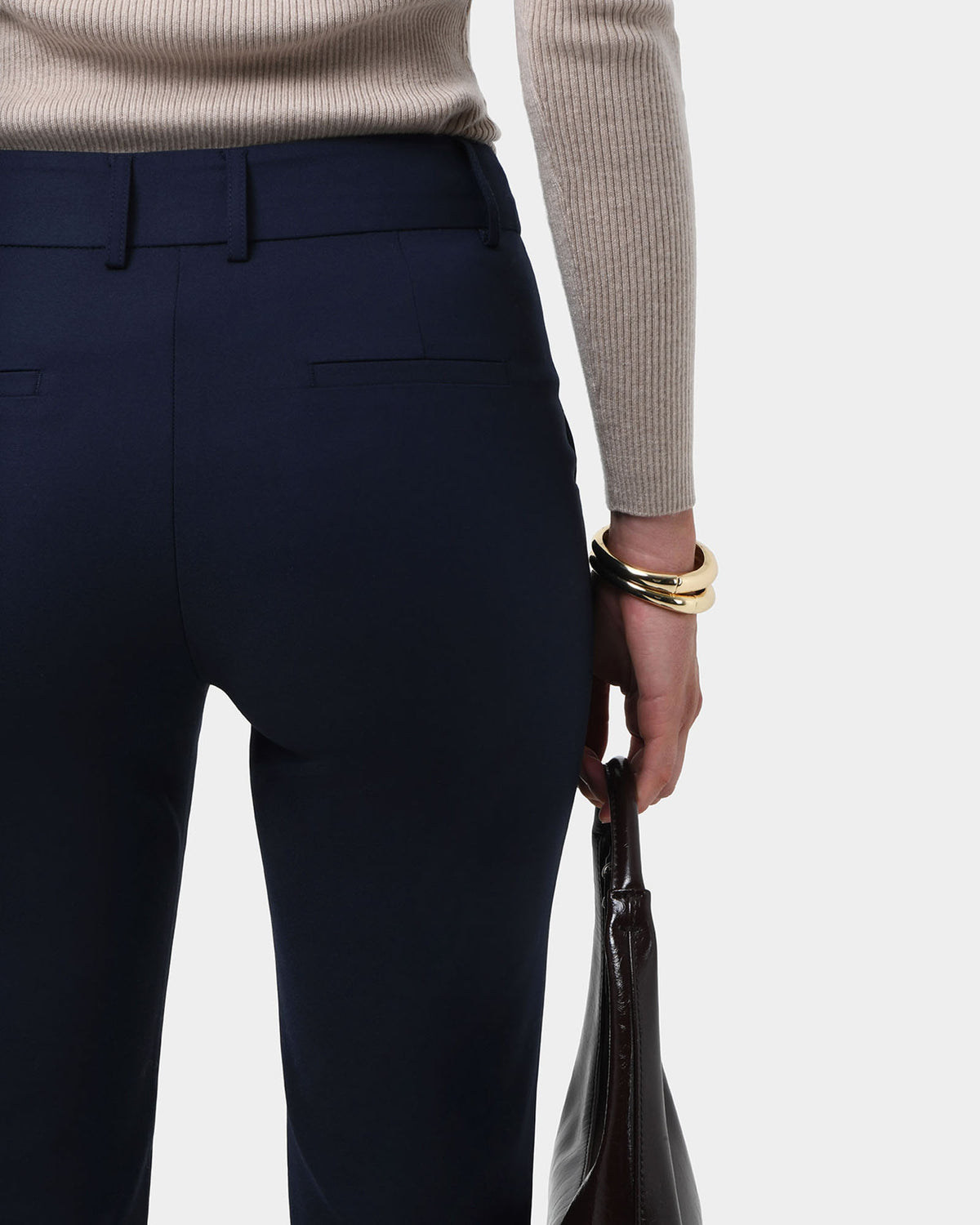 Safira High-Waist Trousers in navy — fabric detail