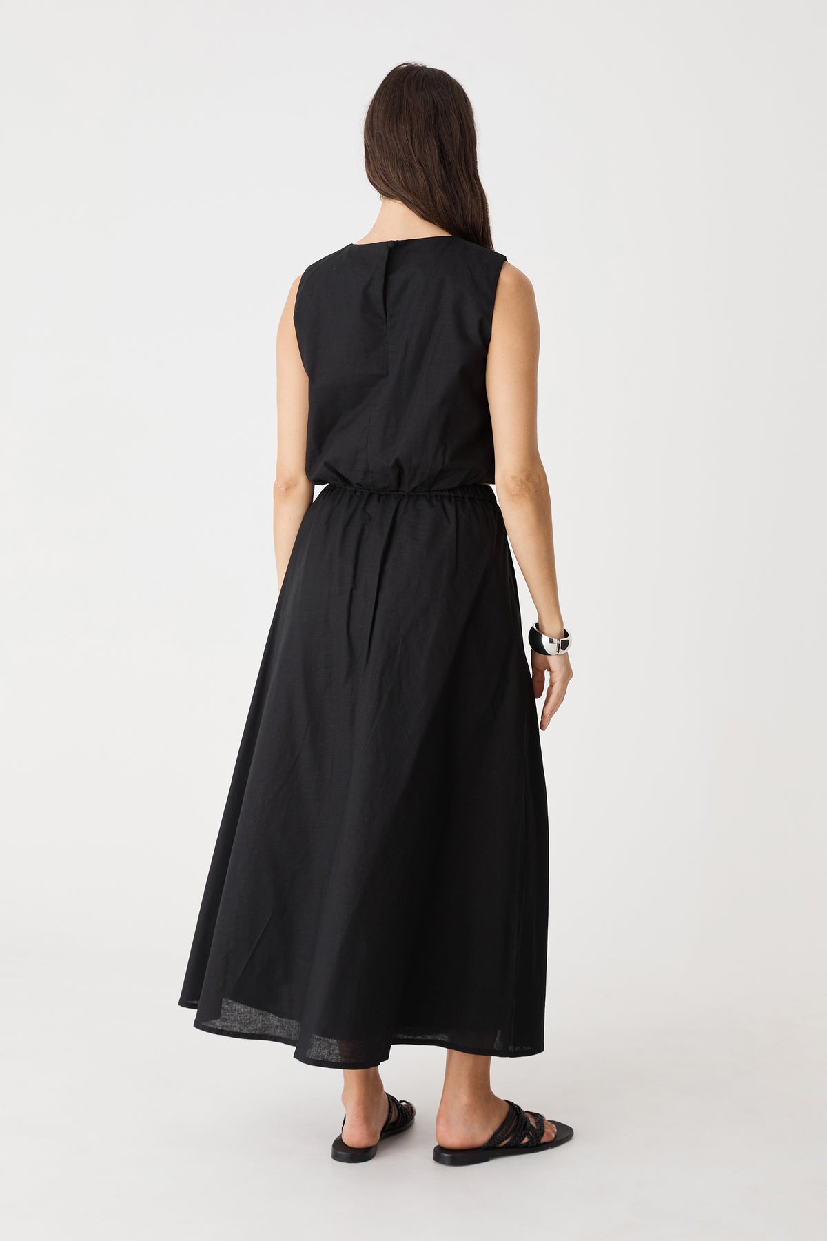 Back view of the black Kenya Linen Skirt with matching top