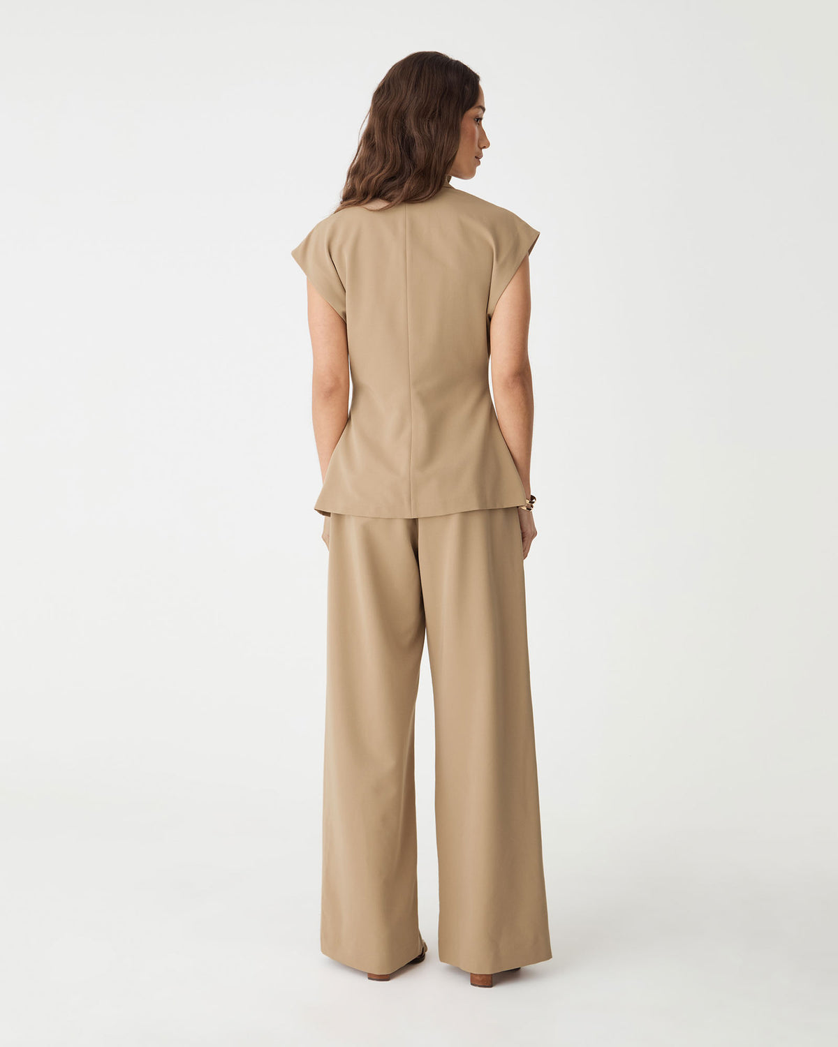 Back view of the camel blazer and matching wide leg pants