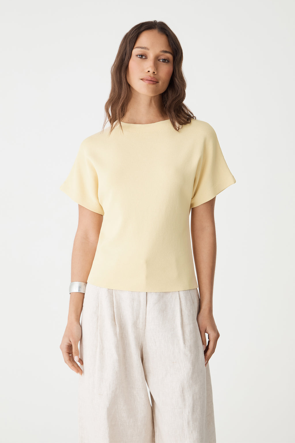 Close front view of the butter yellow Jemma Relaxed Knit Top showing round neckline and dropped shoulder sleeves