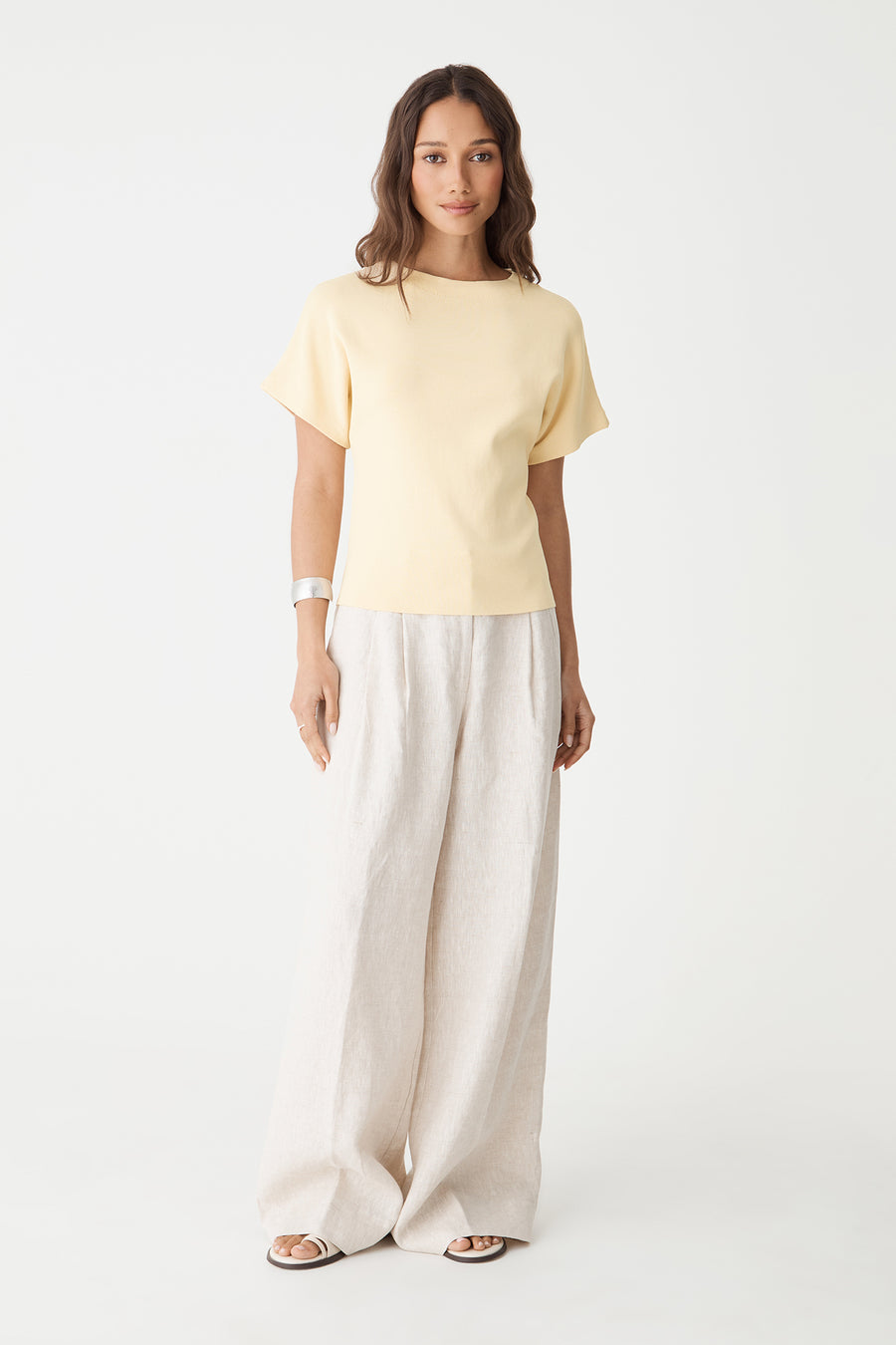 Jemma Relaxed Knit Top in butter yellow, front view worn with cream wide-leg trousers