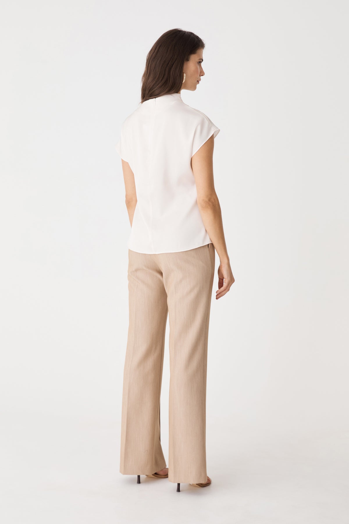 Back view of the pearl Zafina Pleated Draped Top with invisible back zipper