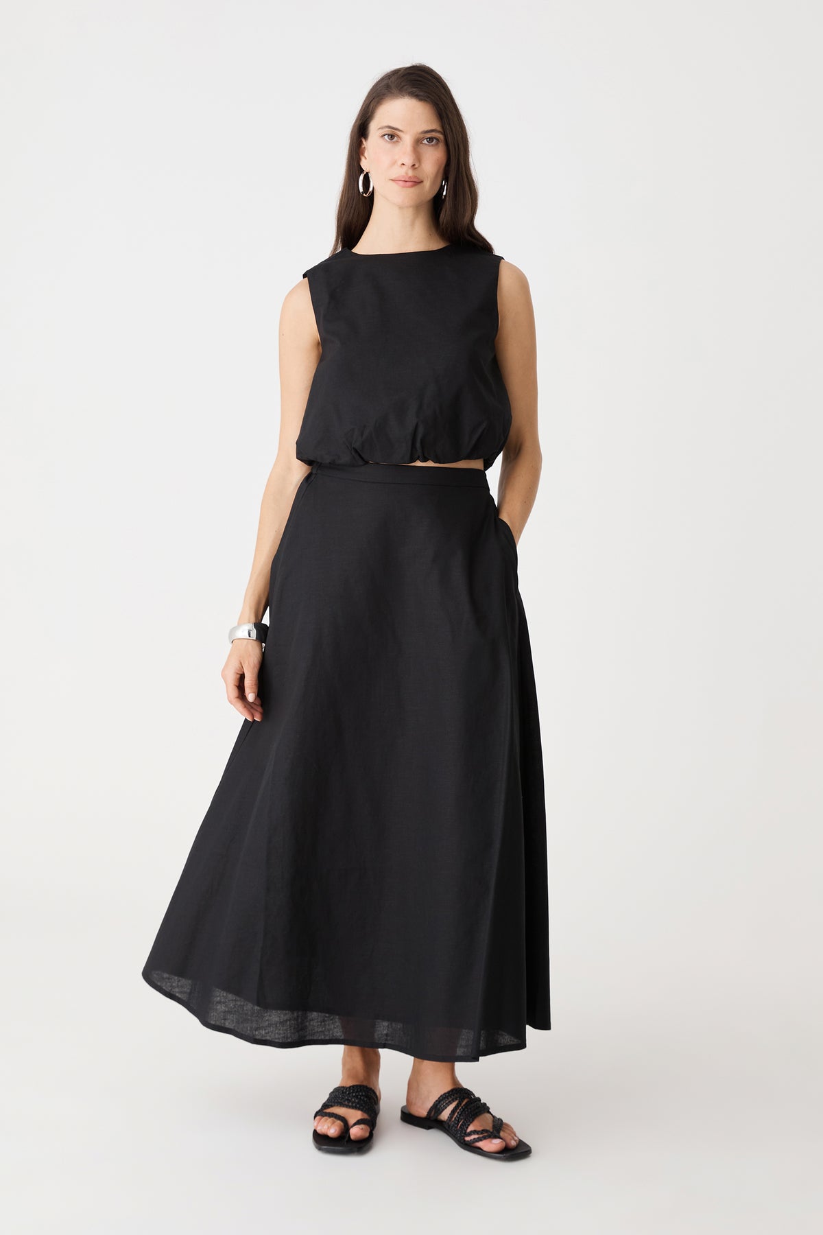 Kenya 2 Ruched Linen Top in black, front view, worn with matching black Kenya Linen Skirt