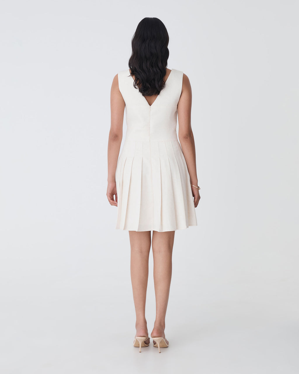 Mikala Pleated Mini Dress in rice marle — back view