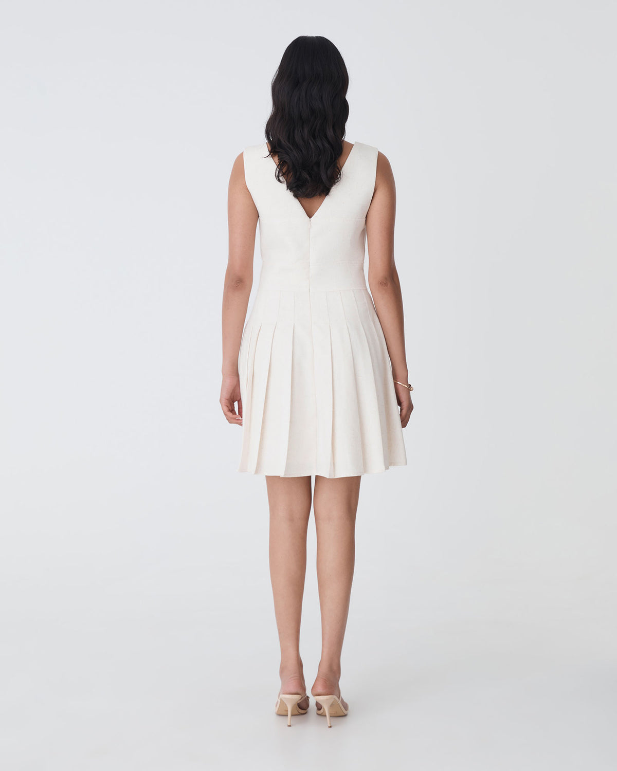 Mikala Pleated Mini Dress in rice marle — back view