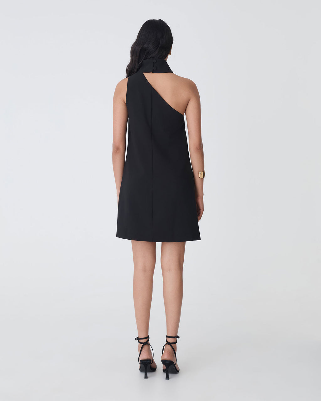 Lydia One Shoulder Mini Dress in black — back view