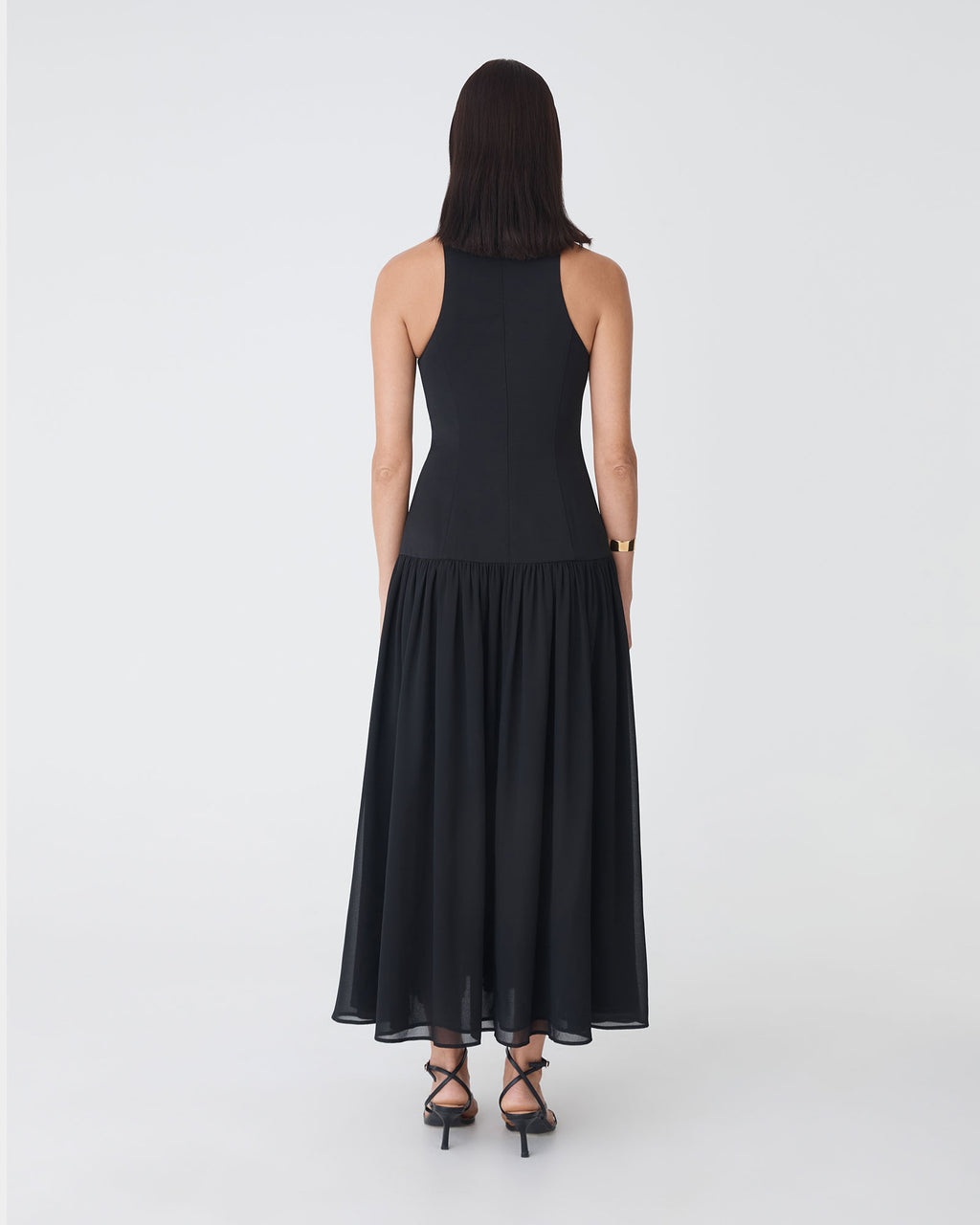 Selena Dropped Waist Dress in black — back view