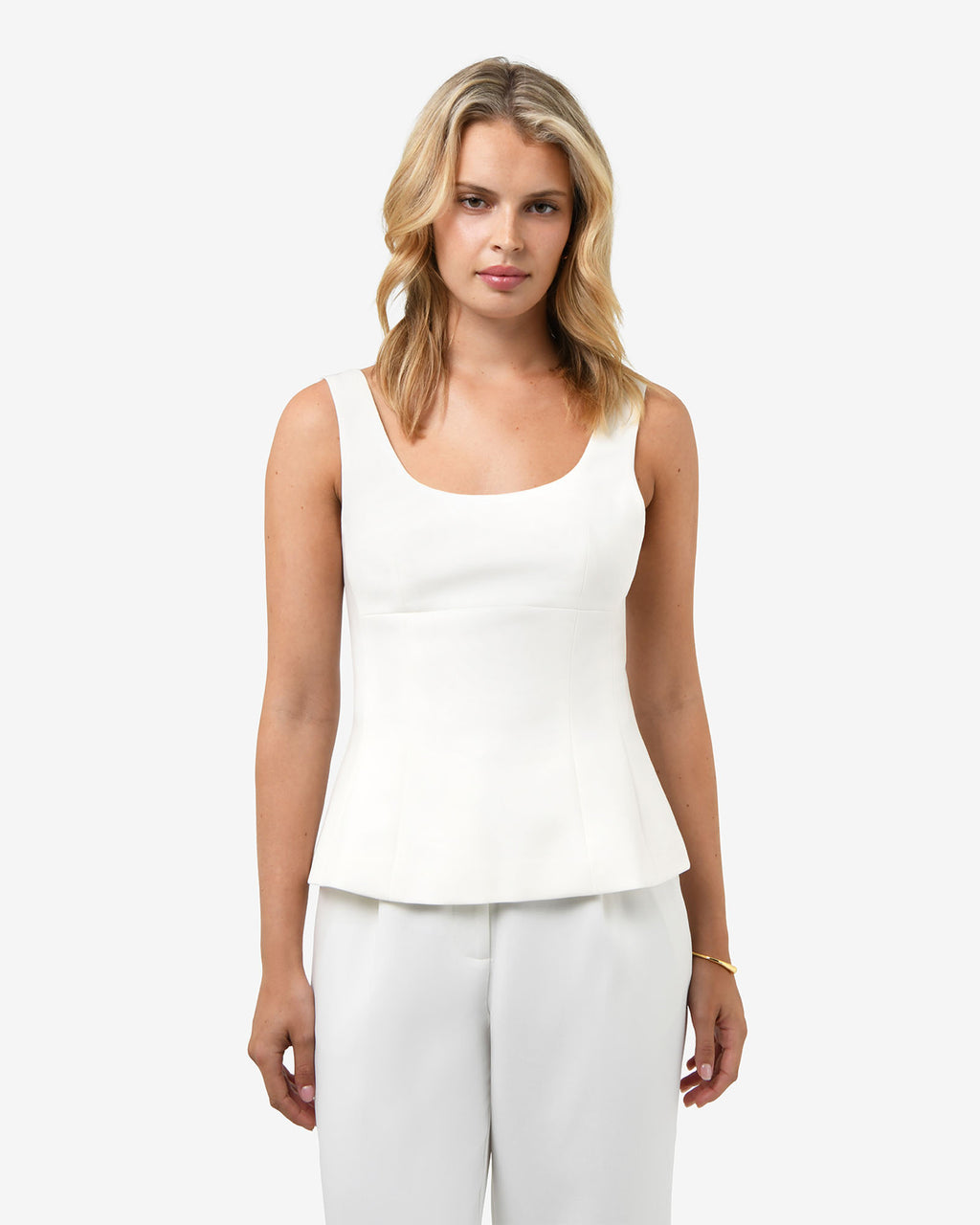 Nikki Peplum Top in ivory — close-up view