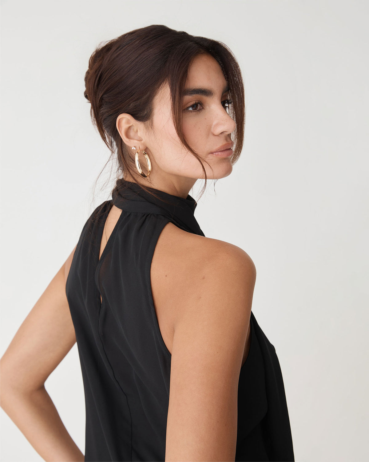 Shelby Draped Sleeveless Top in black — back view