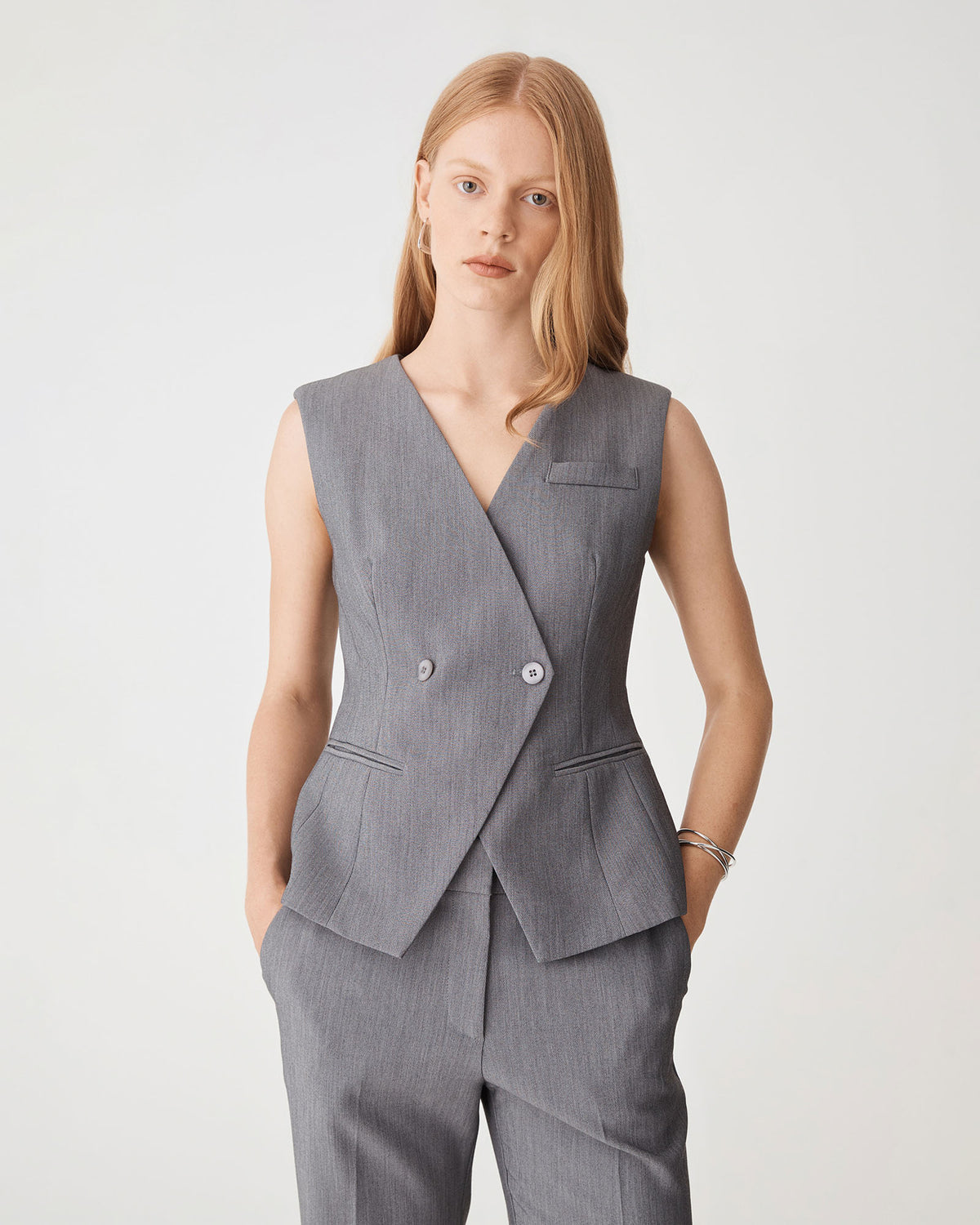 Nikki Collarless Vest in melange grey — close-up view