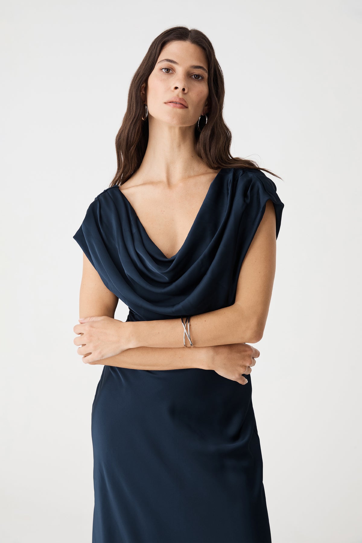 Close-up of the draped cowl neckline on the Midnight satin dress