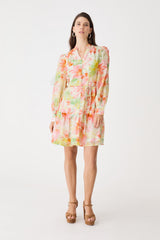 Juliet Long Sleeve Dress in pink floral print, front view of tiered mini dress worn with heeled sandals