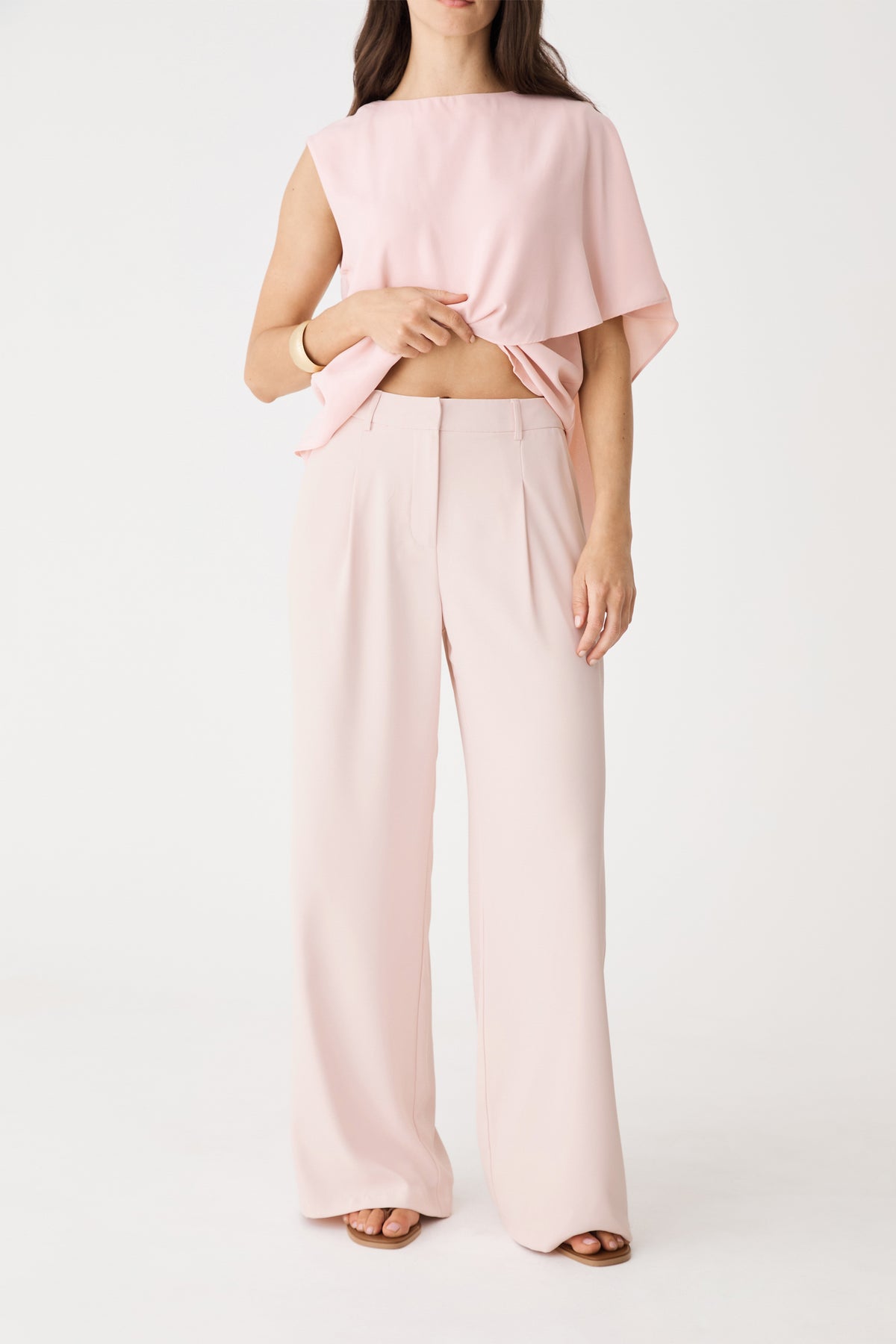 Front close view of the Fairy Floss pleated wide-leg pants showing front pleats and waistband