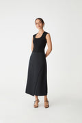 Jennifer ALine Faux Wrap Skirt in black, front view worn with a black sleeveless top