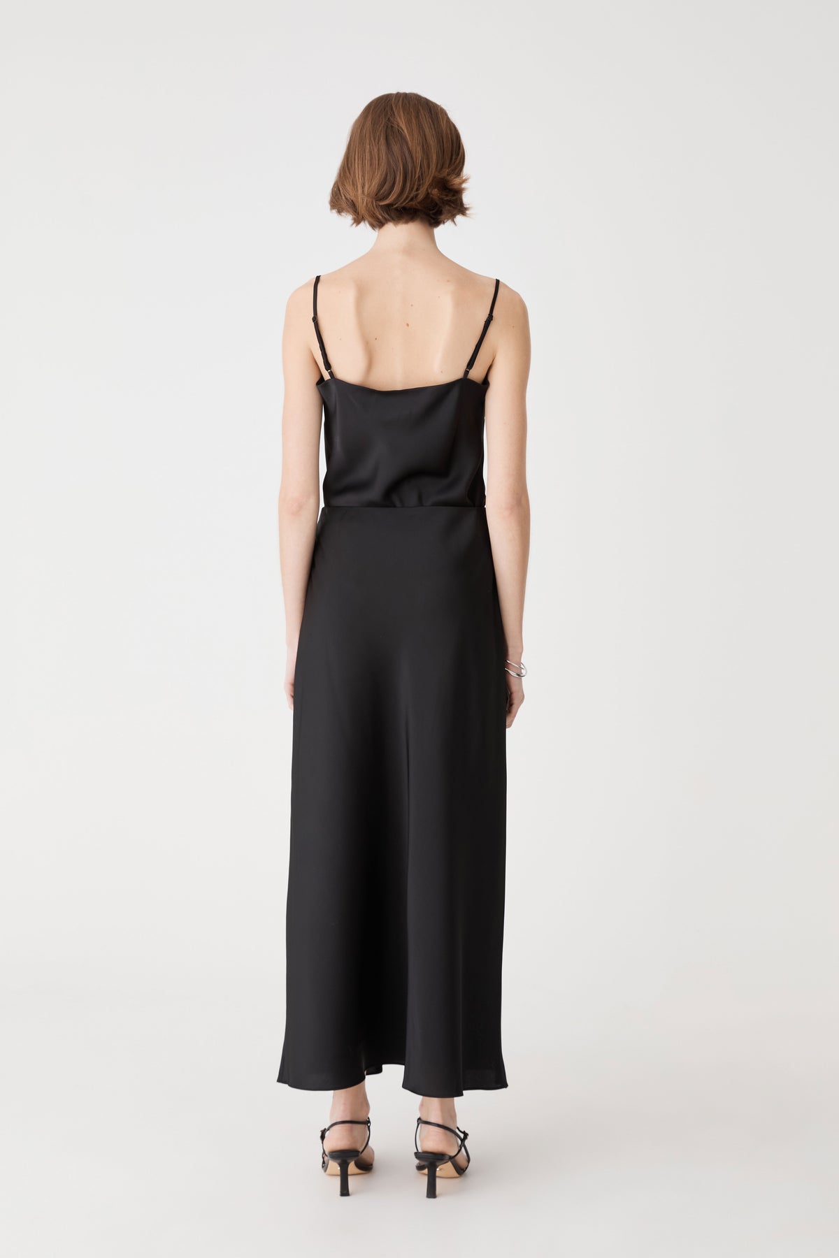Louise Bias Satin Skirt in black — back view