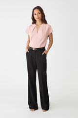Jane Pleated Neck Top in pale pink, front view worn with black wide-leg trousers and belt