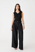 Shayna Bamboo Cowl Top in black, front view worn with black wide-leg trousers and belt