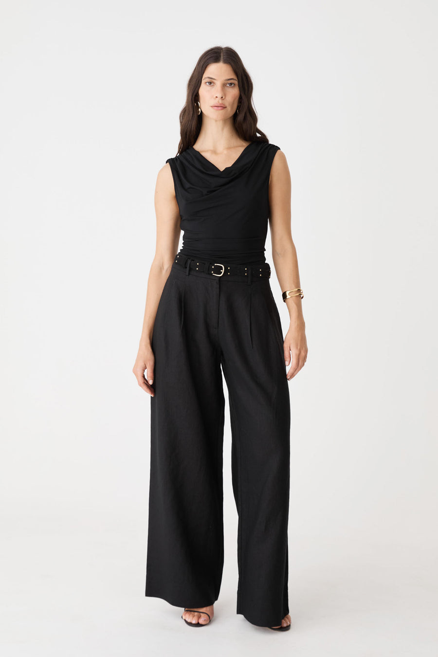 Shayna Bamboo Cowl Top in black, front view worn with black wide-leg trousers and belt