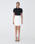 Nikki Mini Wrap Skirt in ivory — full-length view